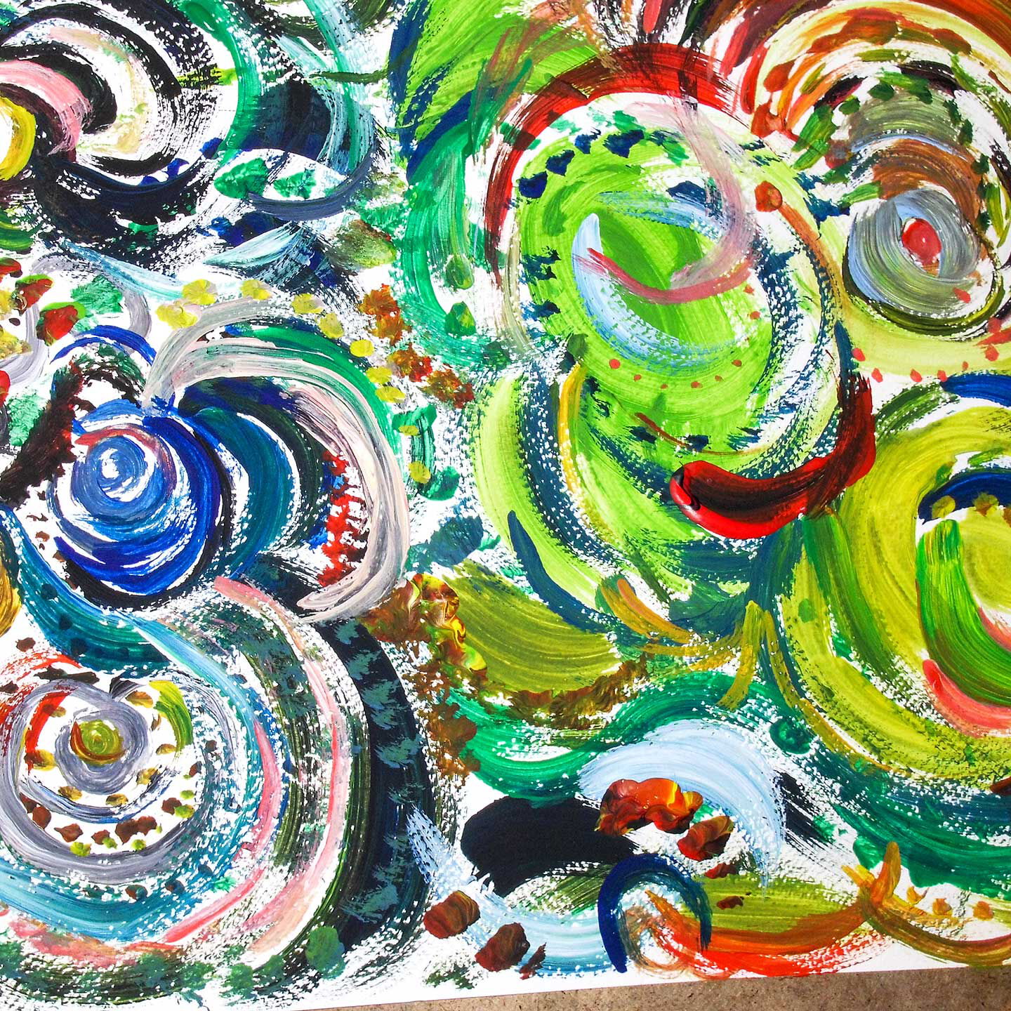 Ein abstraktes Gemälde aus der Malen- und Zeichenwerkstatt des Kreativzentrums. Es fließen viele bunte Kreise ineinander.